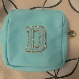 Mini lagoon pouch with sewn D Patch Stoney Clover